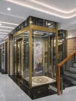 thi công thang máy cửa kính