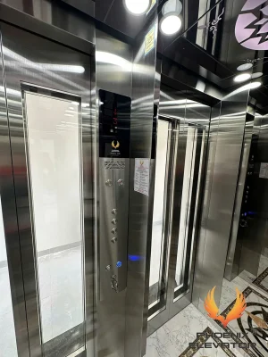 Cabin thang máy gia đình GD05 ốp inox gương trắng kết hợp inox sọc trắng, cửa có ô kính cường lực
